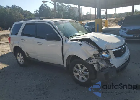 2010 Mazda Tribute I z USA, uszkodzony, nr VIN 4F2CY0C72AKM10013